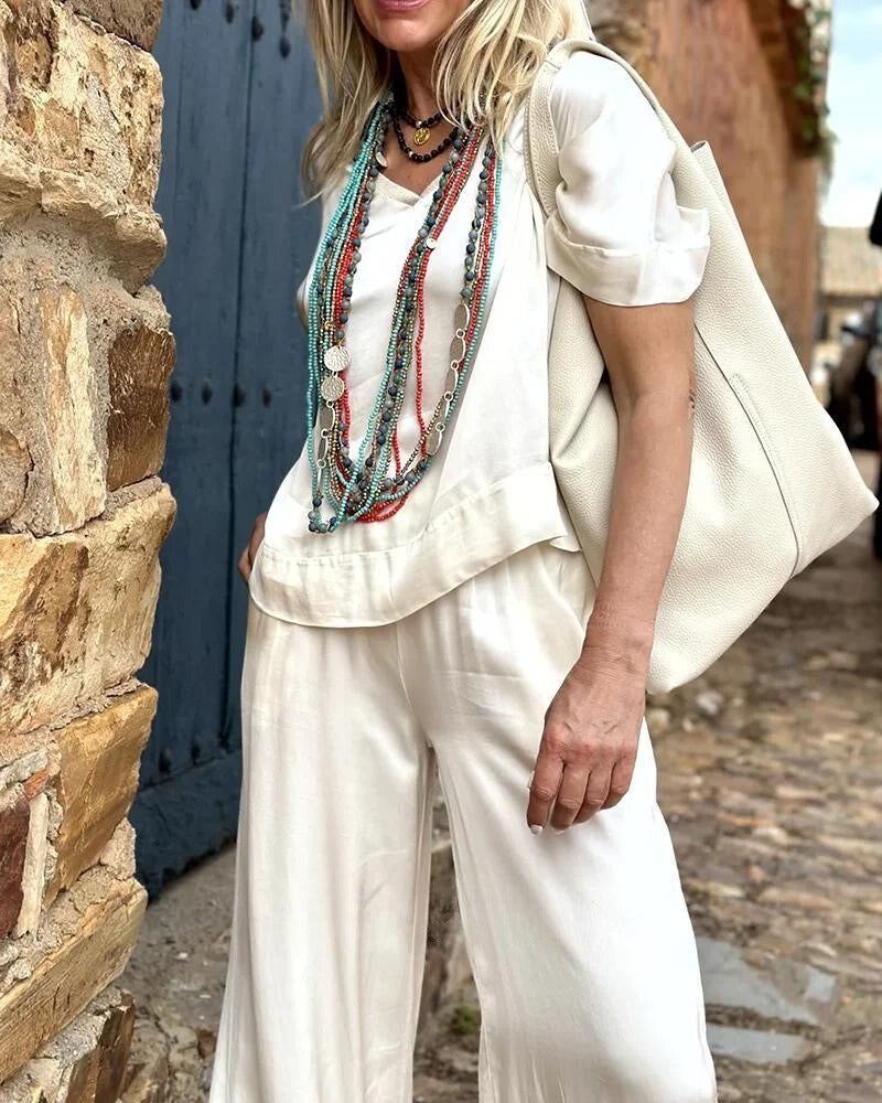 Rivera - Elegancka Biała Bluzka i Spodnie Niebiańskie