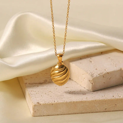 Nora – Elegancki pozłacany naszyjnik w kształcie spirali