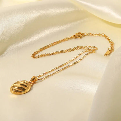 Nora – Elegancki pozłacany naszyjnik w kształcie spirali