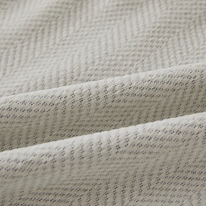 Stylowy dodatek z chenille do Twojej kanapy