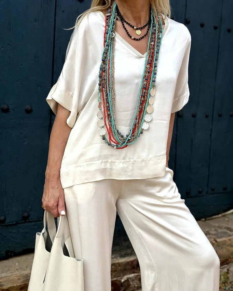 Rivera - Elegancka Biała Bluzka i Spodnie Niebiańskie