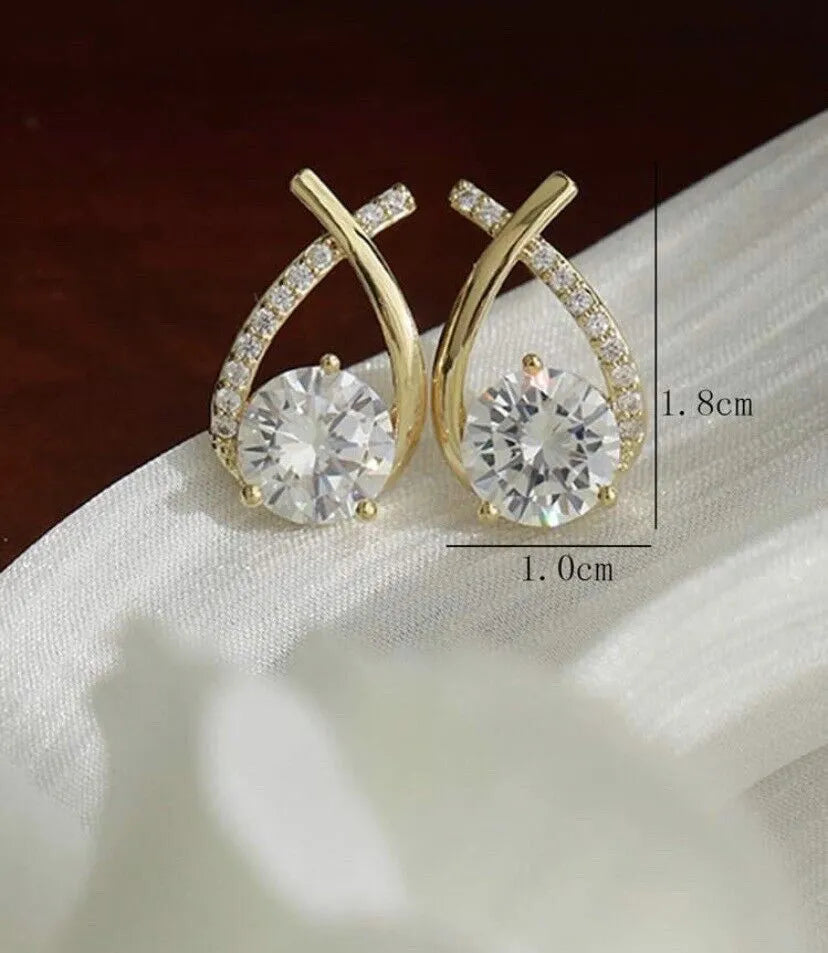 Elena – Kolczyki z Krzyżowym Wzorem i Lśniącymi Cyrkoniami