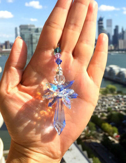 Figurka anioła z magicznym łapaczem słońca