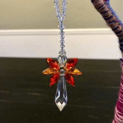 Figurka anioła z magicznym łapaczem słońca